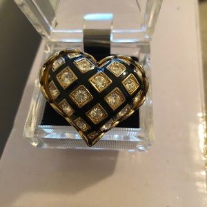 Black and gold heart shaped ring